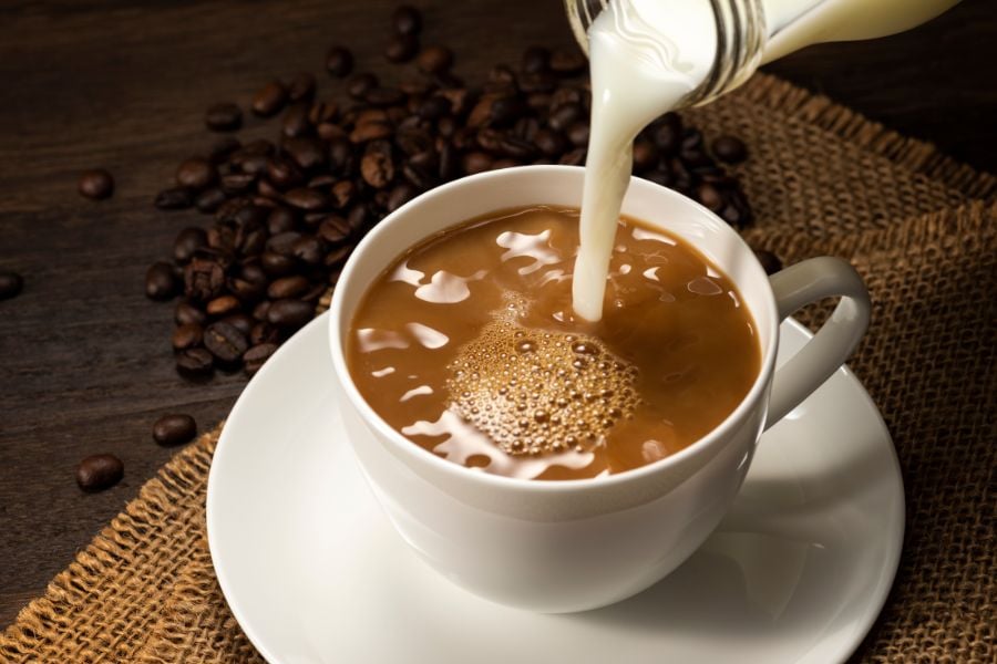 5 cách uống cà phê không lo răng bị ố vàng- Ảnh 2.