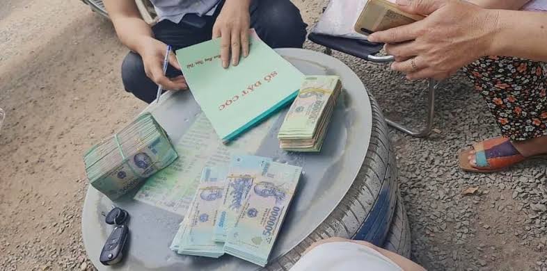 Cần lưu ý gì khi đặt cọc mua đất để tránh mất tiền, kiện tụng?- Ảnh 1.